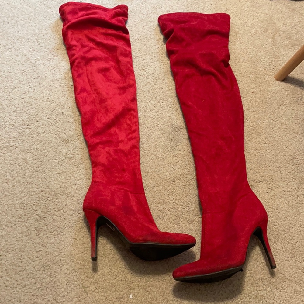 Red thigh high heeled boots